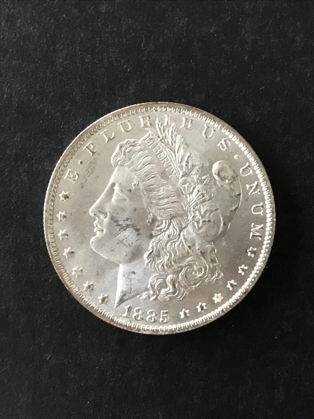 1885 O Morgan Silver Dollar, 90% Silver, New Orleans Mint, Unc, ? Low to Mid MS